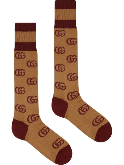 Shop Gucci Logo-intarsia Socks In Brown