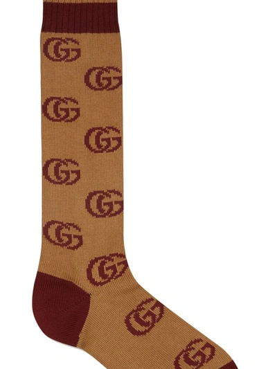 Shop Gucci Logo-intarsia Socks In Brown