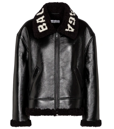 Balenciaga Shiny Leather Bonded Shearling Coat In Noir | ModeSens