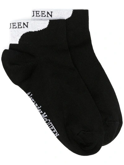 Shop Alexander Mcqueen Logo-embroidered Socks In Black