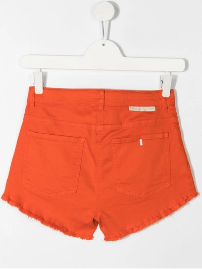 Shop Stella Mccartney Teen Frayed Denim Shorts In Orange