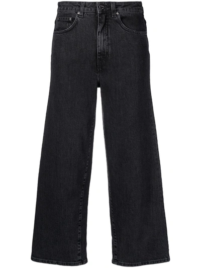 Shop Totême High-waisted Wide-leg Jeans In Black