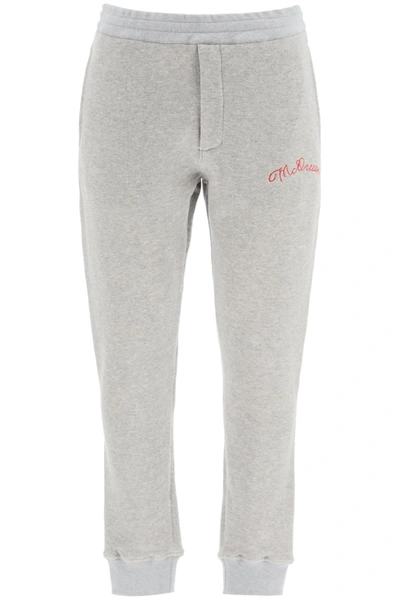 Shop Alexander Mcqueen Sweatpants With Logo Embroidery In Pale Grey (grey)