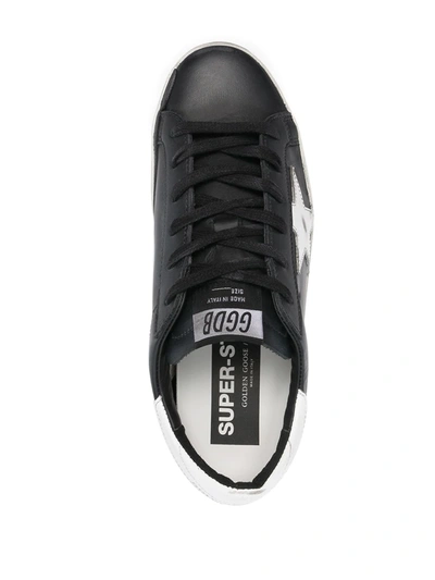 Shop Golden Goose Superstar Distressed-finish Sneakers In Black