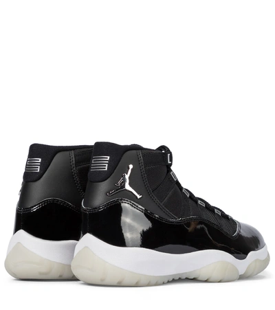Shop Nike Air Jordan 11 Retro Sneakers In Black