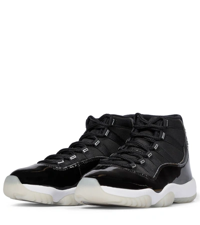 Shop Nike Air Jordan 11 Retro Sneakers In Black