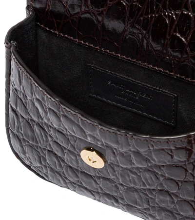 Shop Saint Laurent Kaia Croc-effect Leather Belt Bag In Brown