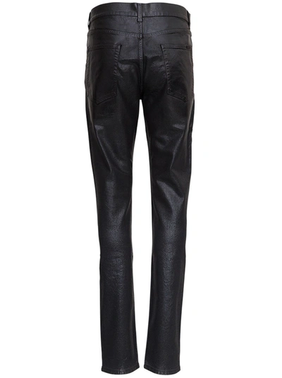 Shop Saint Laurent Skinny Jeans In Shiny Effect Stretch Denim In Black