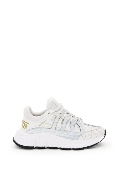 Shop Versace Trigreca Sneakers In Bianco Oro