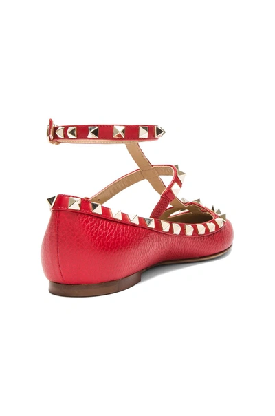 Shop Valentino Rockstud Leather Ballerina Flats In Rosso