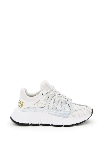 Shop Versace Trigreca Sneakers In White/gold/grey