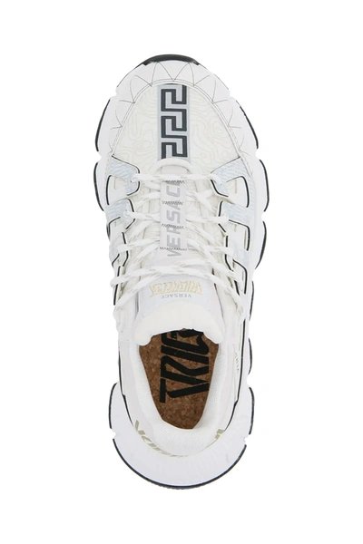 Shop Versace Trigreca Sneakers In White/gold/grey