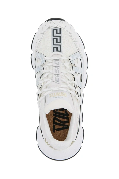 Shop Versace Trigreca Sneakers In White,gold,grey
