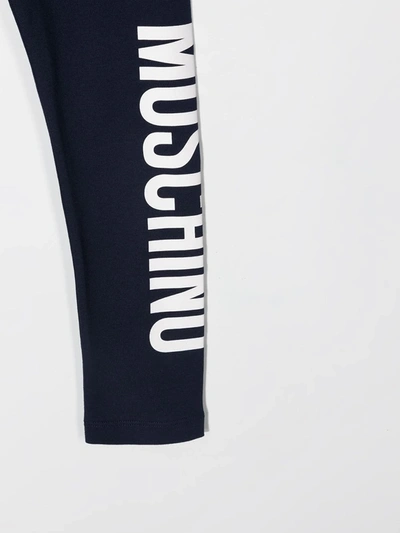 Shop Moschino Logo Print Leggings In Blue
