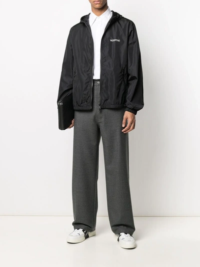 Valentino Hooded Logo-print Technical Windbreaker Jacket In Black