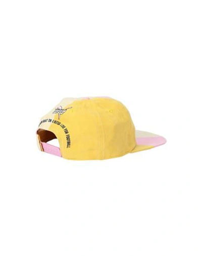 Shop Puma Xuper Studios Hats In Yellow