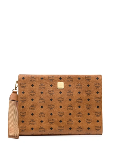 Shop Mcm Monogram-print Clutch In Brown