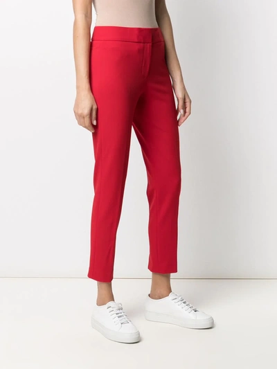 Shop Dkny Cropped Slim-cut Trousers In Red