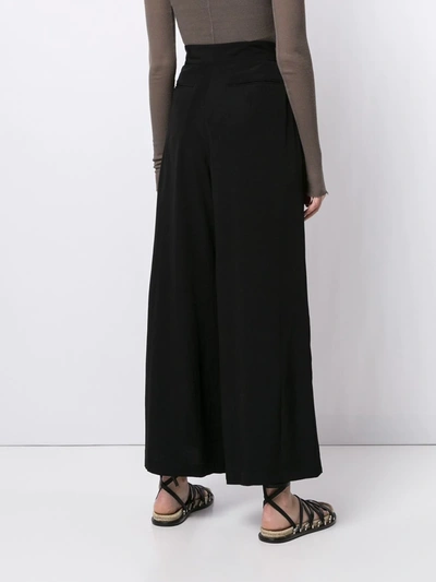 Shop Yohji Yamamoto Belted Wide-leg Trousers In Black