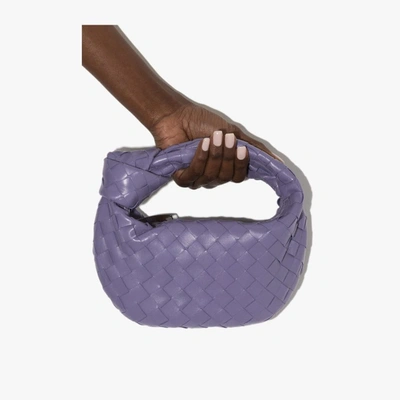 Shop Bottega Veneta Purple Mini Jodie Leather Clutch Bag