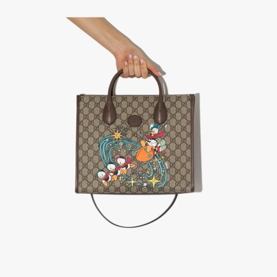 Shop Gucci X Disney Brown Donald Duck Gg Supreme Tote Bag