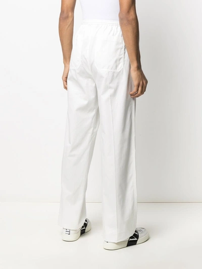 Shop Valentino Loose Fit Trousers In White