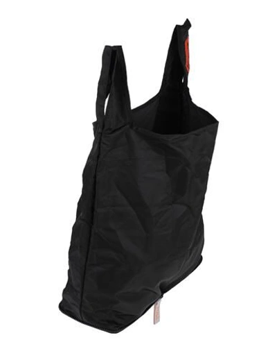 Shop Heron Preston Handbags In Black