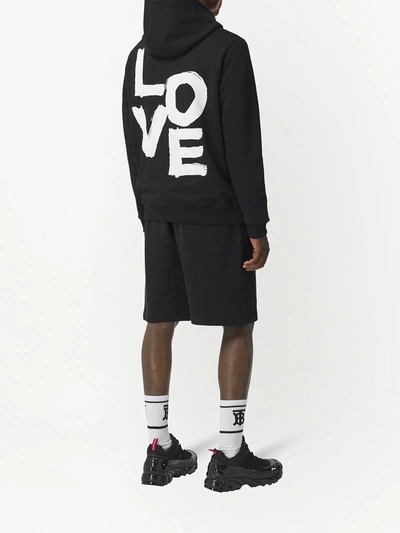 Shop Burberry Love-print Organic Cotton Hoodie In Black