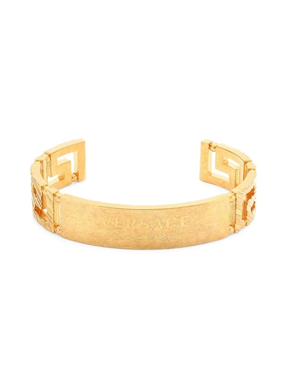 Shop Versace Cuff Bracelet In Tribute Gold