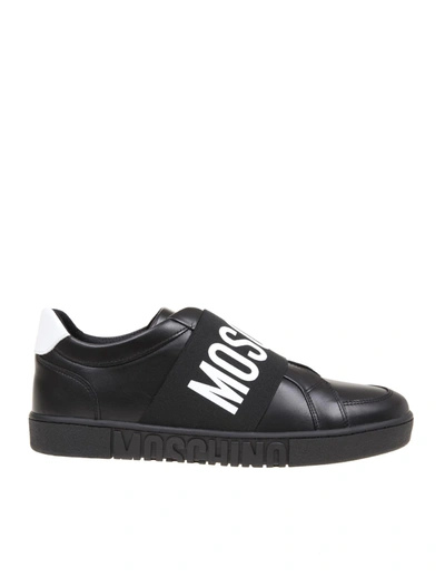 Shop Moschino Slip On In Leather With Logo Band In Black /white