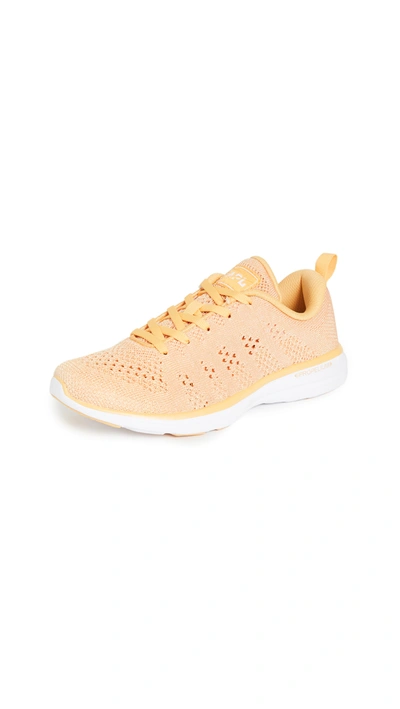 Shop Apl Athletic Propulsion Labs Techloom Pro Sneakers In Golden Sun/white