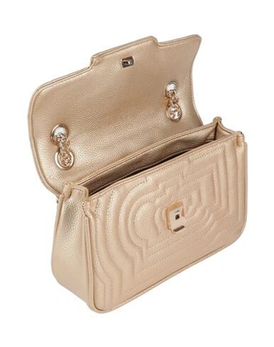 Shop Gaelle Paris Handbags In Gold