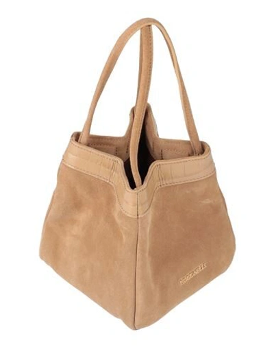 Shop Coccinelle Handbags In Camel