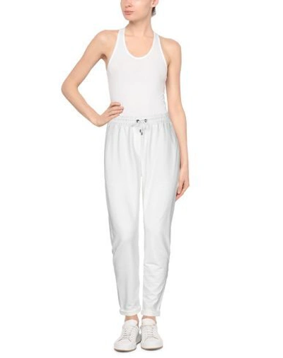 Shop Brunello Cucinelli Cropped Pants In White