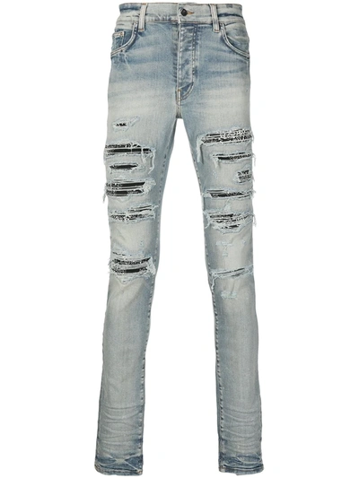 Shop Amiri Distressed Slim-fit Jeans In Blue