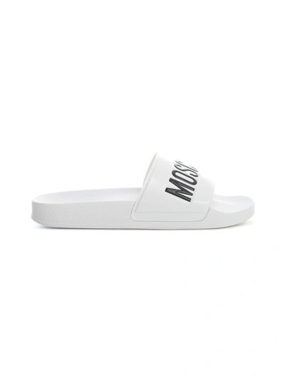 Shop Moschino Slippers In White
