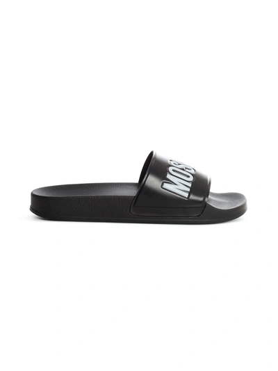Shop Moschino Slippers In Black