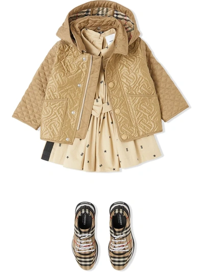 Shop Burberry Monogram Quilted Jacket In Brown