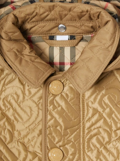 Shop Burberry Monogram Quilted Jacket In Brown