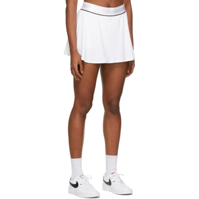 Shop Nike White Court Dri-fit Flouncy Miniskirt In 101 White
