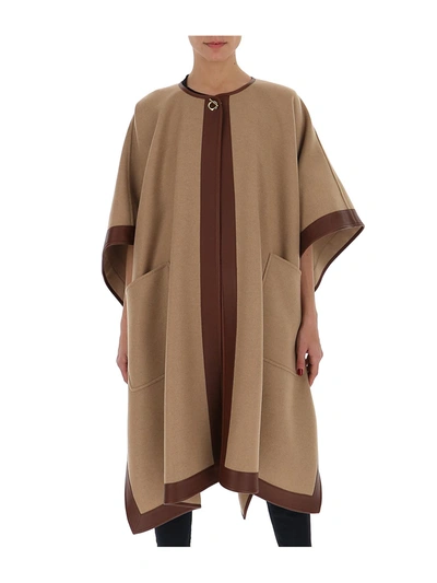 Shop Burberry Contrast Trim Poncho In Brown