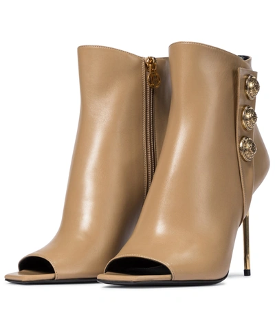 Shop Balmain Sara Leather Ankle Boots In Beige