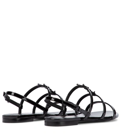Shop Saint Laurent Cassandra Patent Leather Sandals In Black