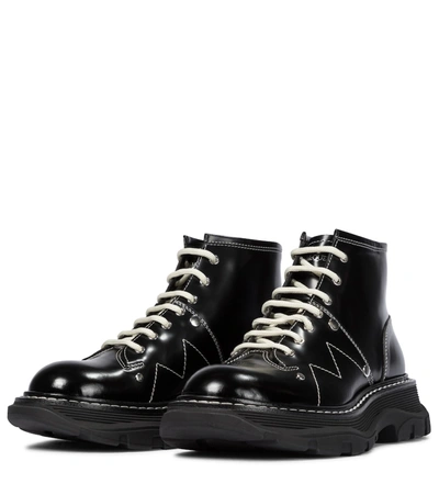 Shop Alexander Mcqueen Tread Leather Ankle Boots In Black