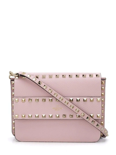 Shop Valentino Small Rockstud Grainy Leather Crossbody Bag In Pink