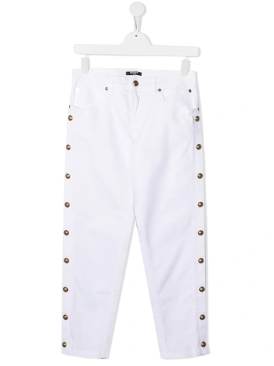 Shop Balmain Teen High-rise Button-embossed Trousers In White