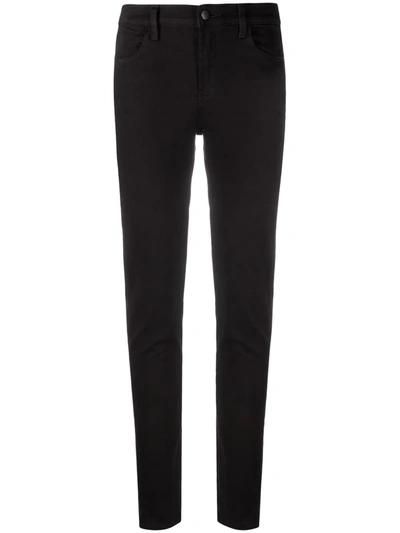 Shop J Brand Mid-rise Skinny Jeans In Black