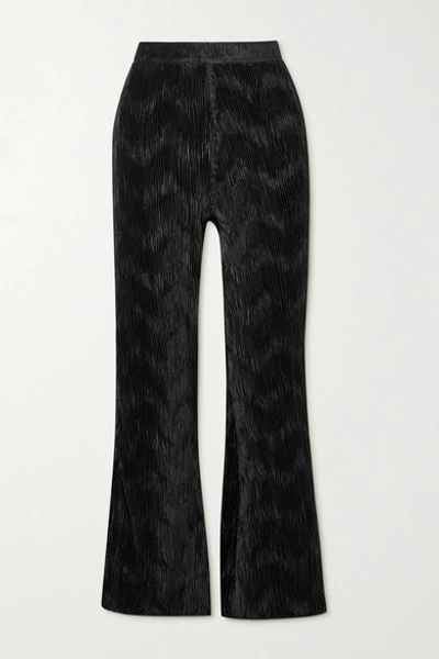 Shop Ganni Plissé-georgette Flared Pants In Black