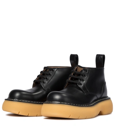 Shop Bottega Veneta Bounce Leather Ankle Boots In Black Nat. Rubber
