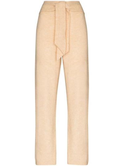 Shop Nanushka Tied Waist Knit Trousers In Neutrals